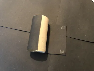 How to Create a Penguin Step 3: Glue the back of the large blank rectangle and then wrap it around the cardboard tube.